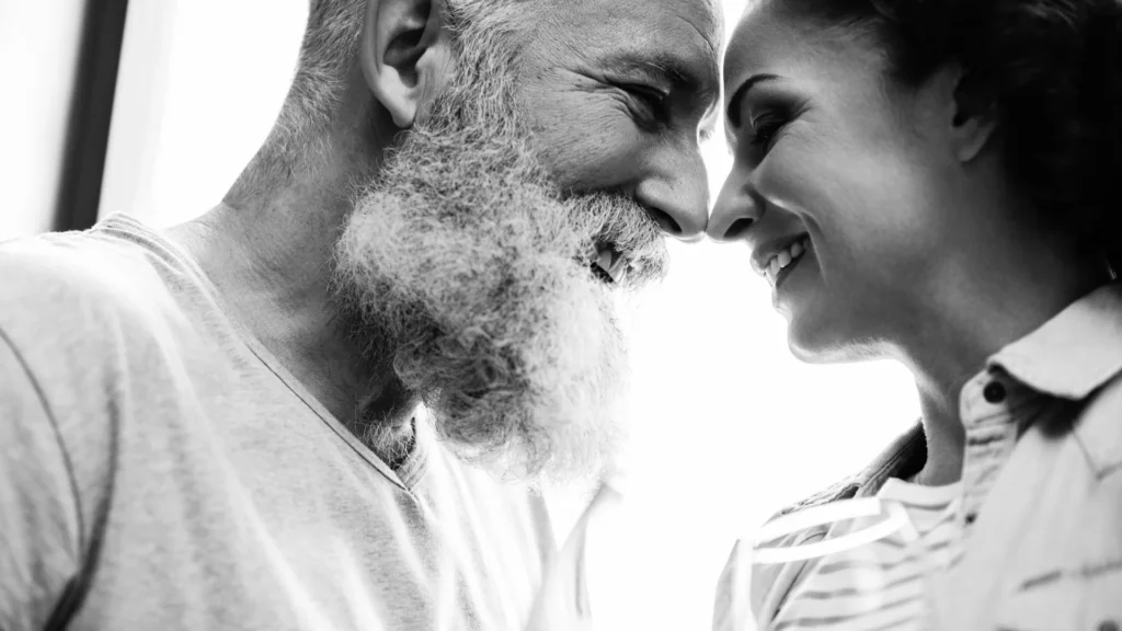 How do dental implants work with dentures?